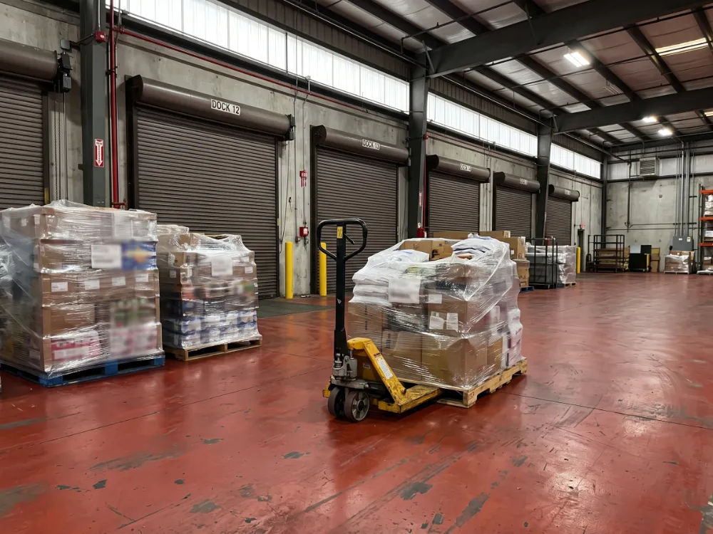 Cargo freight dock with a red urethane mortar floor and pallets