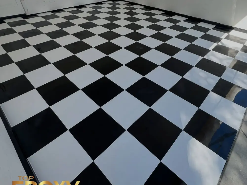 Checker epoxy floor Black-and-white checker epoxy floor at a Fair Oaks Ranch home