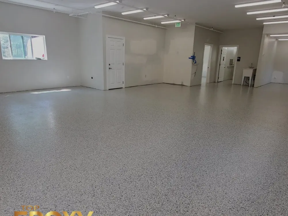 Commercial flake system Neutral flake epoxy running through a retail interior in Santa Clarita
