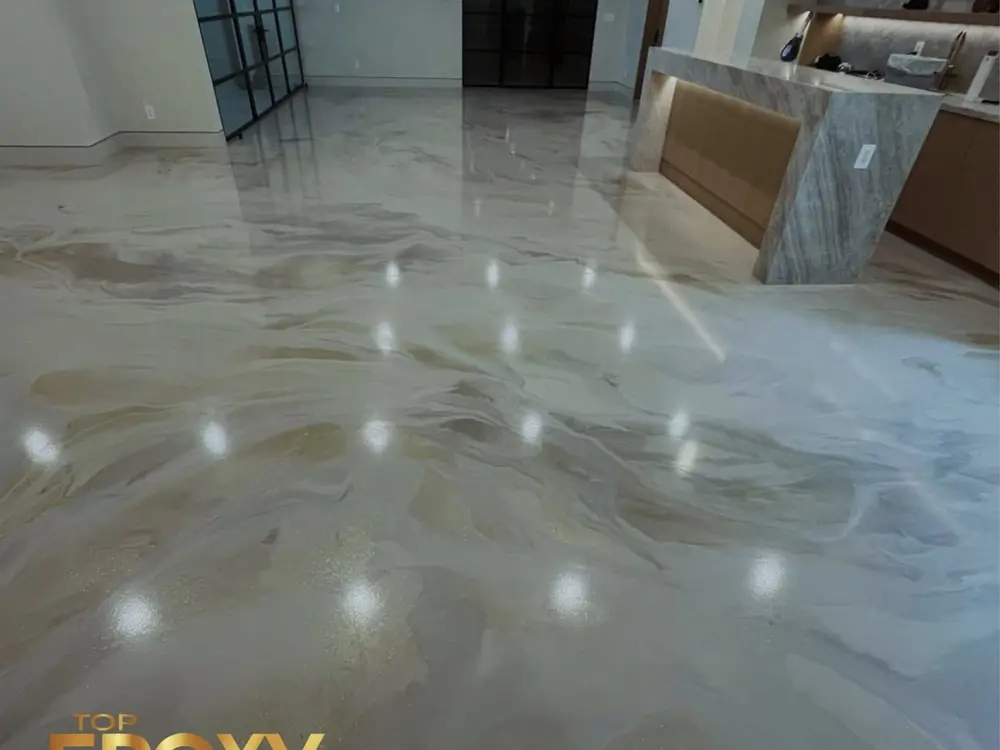 Gold metallic epoxy Marbleized gold metallic epoxy flooring at a Valencia residence