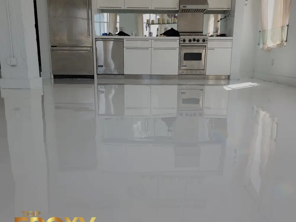 High-gloss white epoxy High-gloss white epoxy flooring in a Santa Clarita kitchen