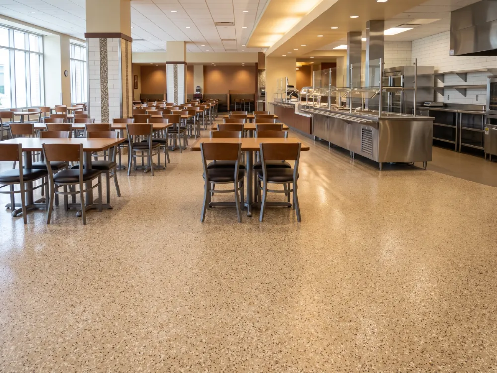 Hospital cafeteria with a beige flake epoxy floor and service line