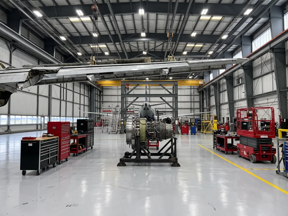 Maintenance hangar with a high-build epoxy floor and engine stand