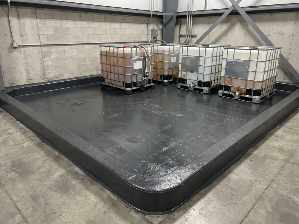 Secondary containment area with Novolac coating and berm curbs