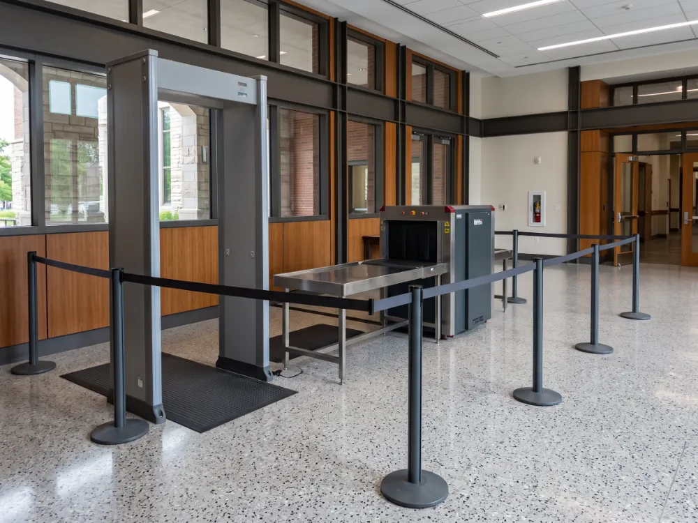Courthouse security screening area with a terrazzo-look epoxy floor
