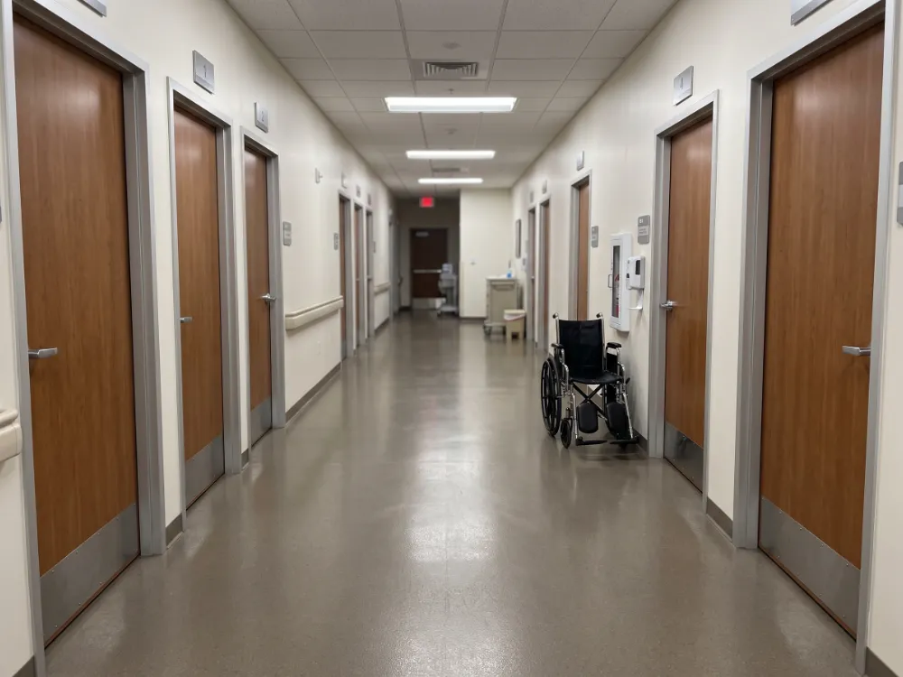 Urgent care corridor with a seamless warm gray epoxy floor